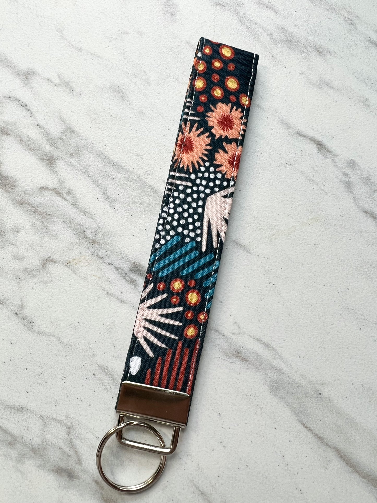 Navy Broderi Floral + Lines Key Wristlet