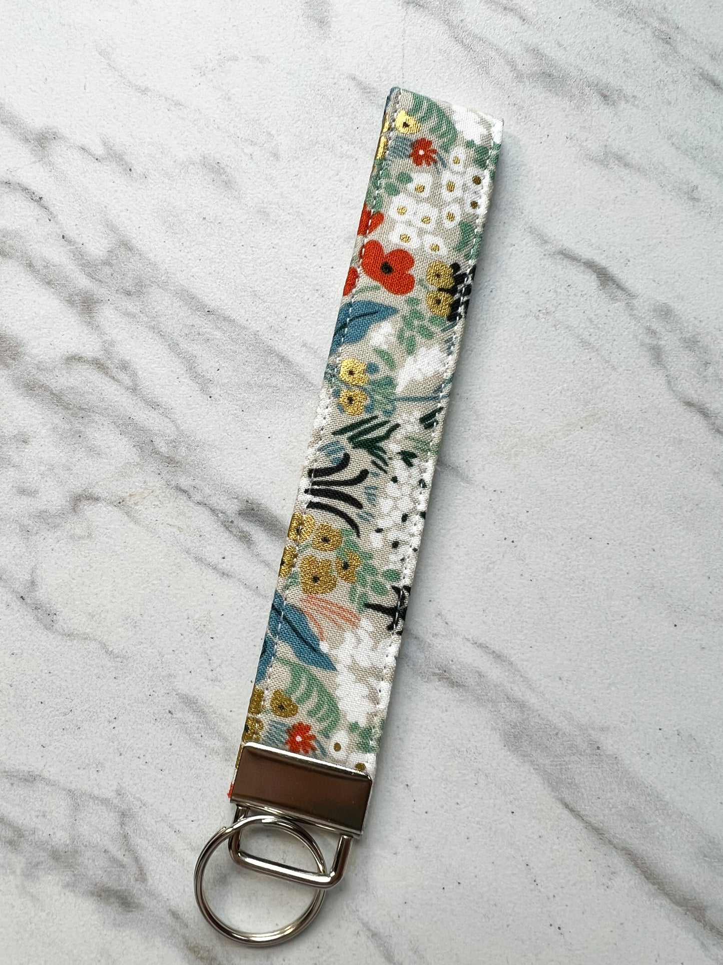 Tan Rifle Paper Co Floral Key Wristlet